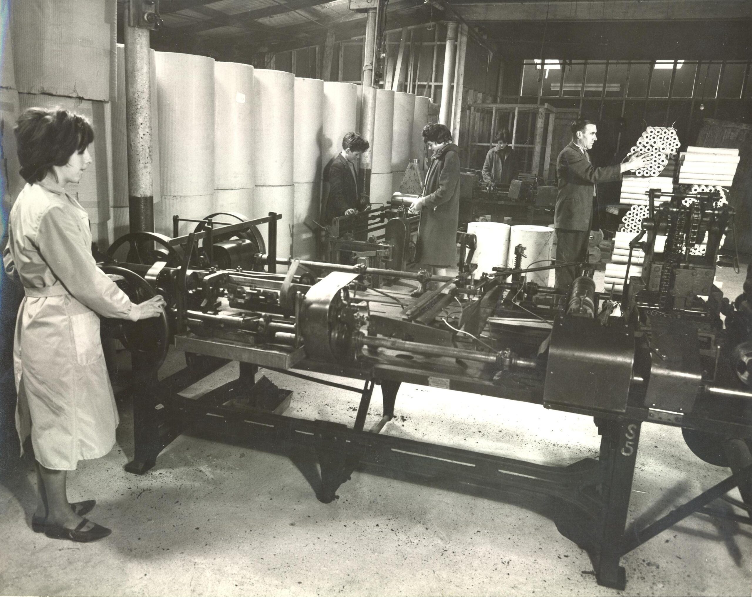 Workers and machines at the first Industrial Packaging plant