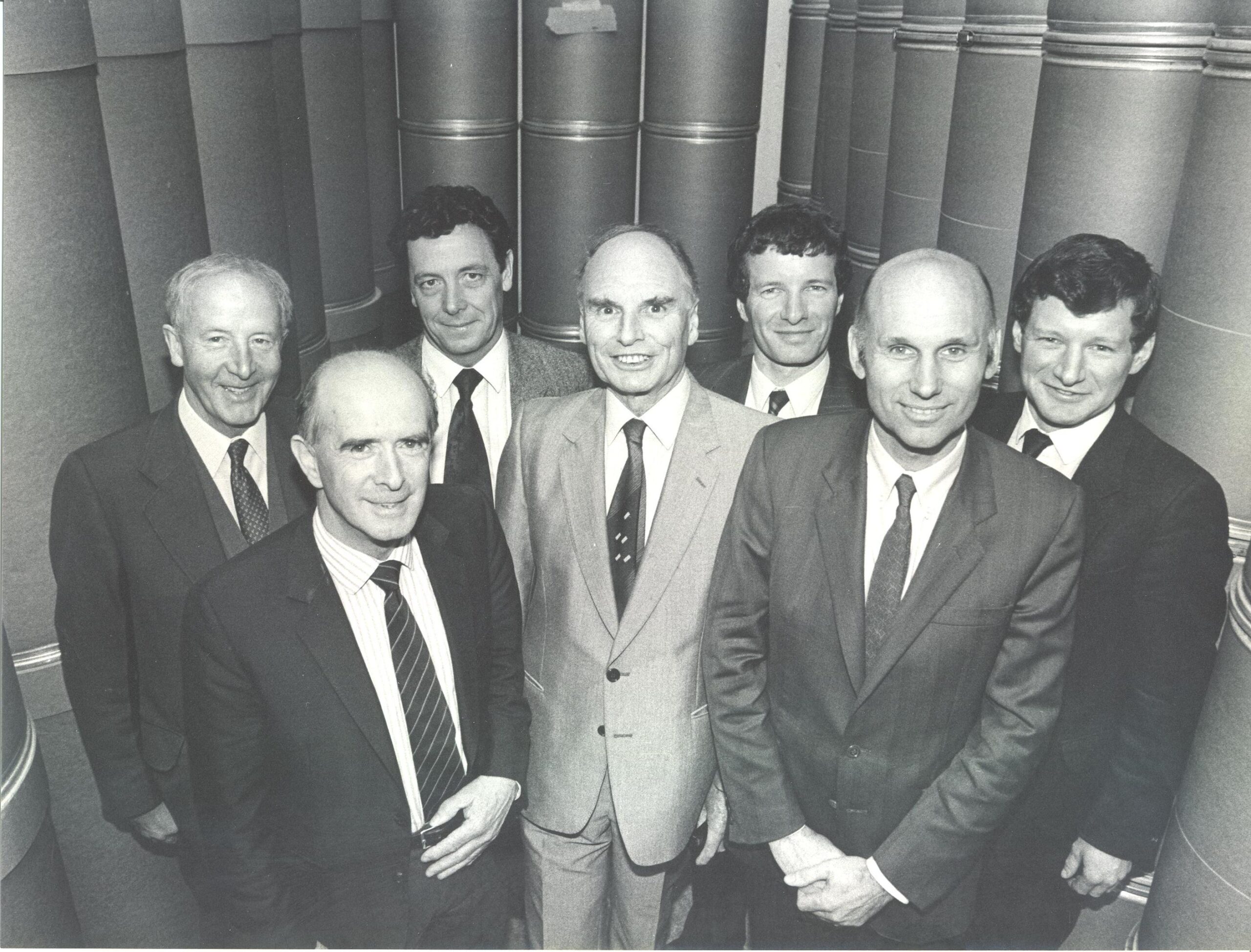 BW photo of Industrial Packaging founders and directors in 1990s